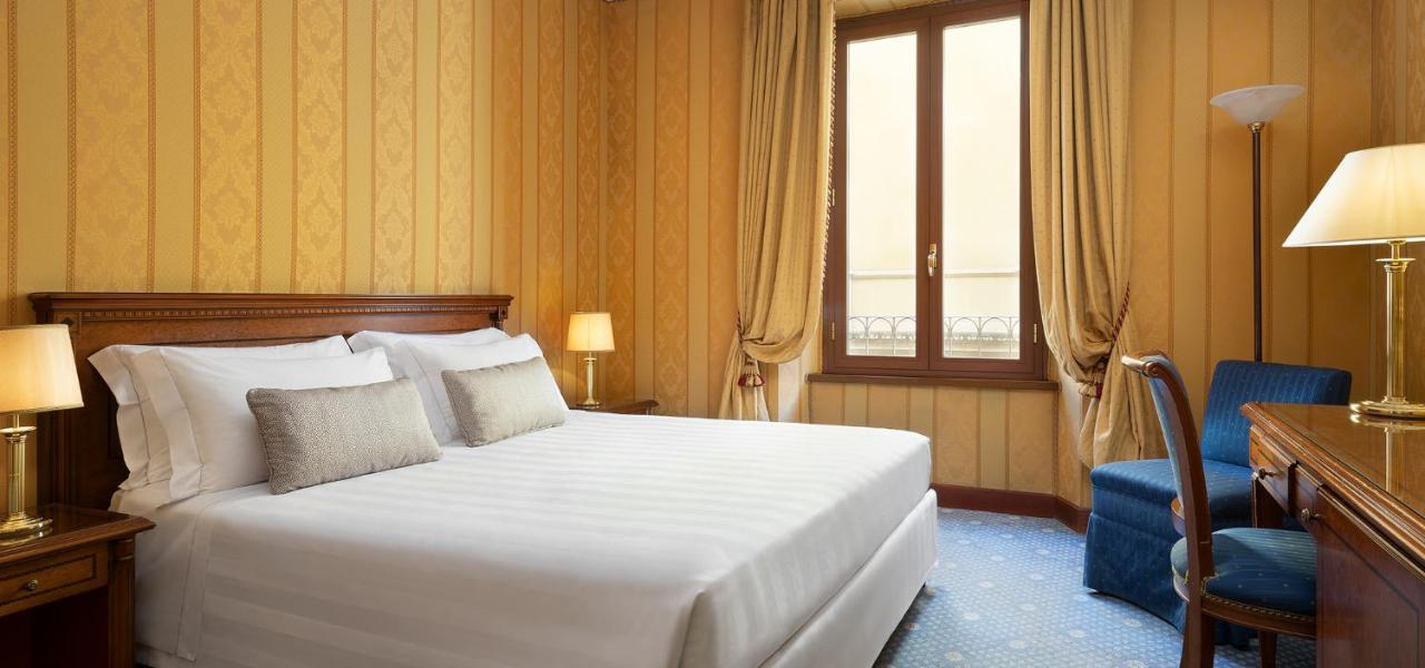 โรงแรมซินา บรูฟานี เปรูจา ภายนอก รูปภาพ A room at the hotel
